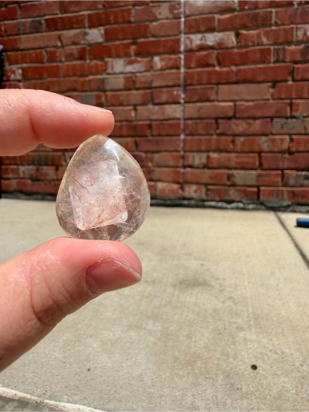 Polished Clear Pink Teardrop Palm Stone